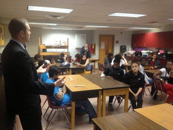 BELVOIR— In June, Young AFCEAN Andrew Renken talks of the importance of science, technology, engineering, and mathematics to students at Walt Whitman Middle School.